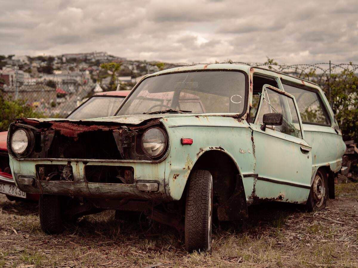 Rusty old car of the kind we buy for cash